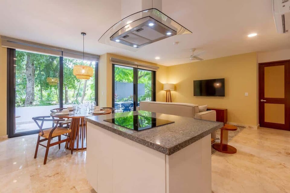 The kitchen island has an induction stove