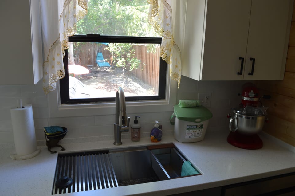 Kitchen with view into backyard