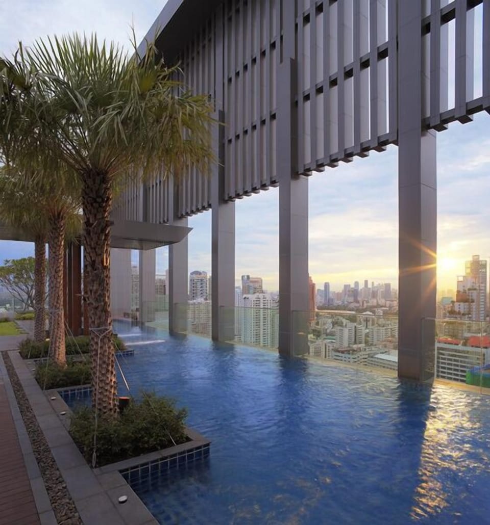 Rooftop infinity pool at sunset. 