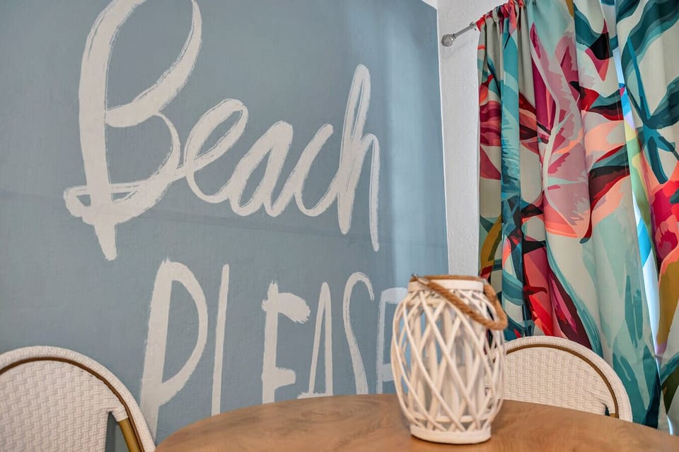 Playful “Beach Please” decor adds a fun coastal vibe & sets the tone for a laid-back getaway.