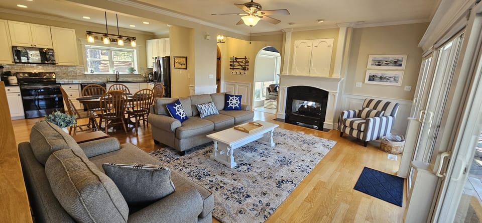 LivingRoom with comfortable seating & open floorplan with direct Lakefront views