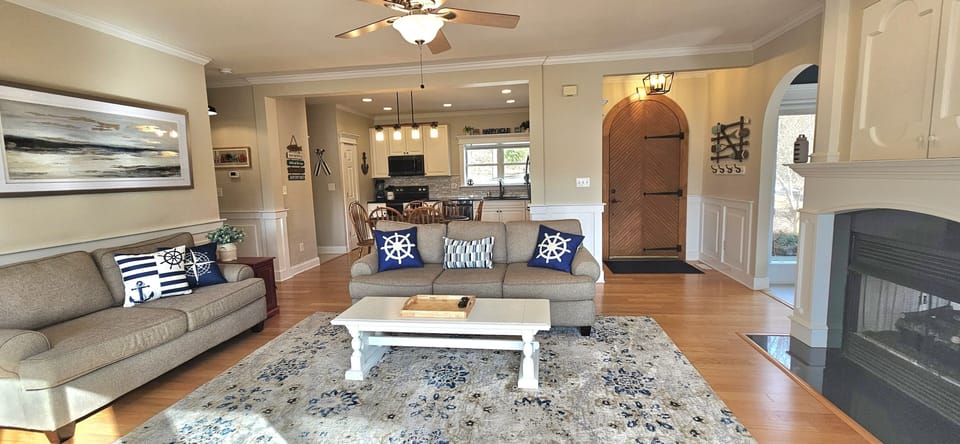 Open Floorplan and lots of great light with a double fireplace in the Main LR