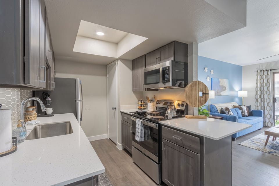 Sleek kitchen design, ready for your next meal.
