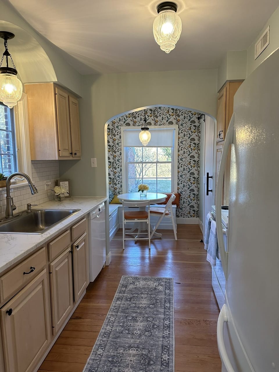View from dining room into kitchen and breakfast nook.