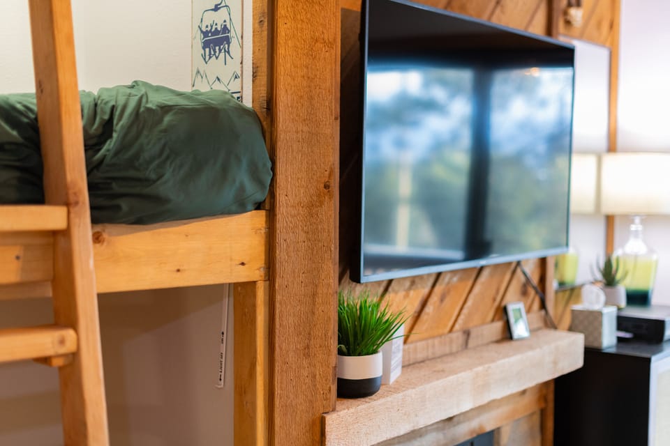 Smart TV & Bunk Bed access off of living area.