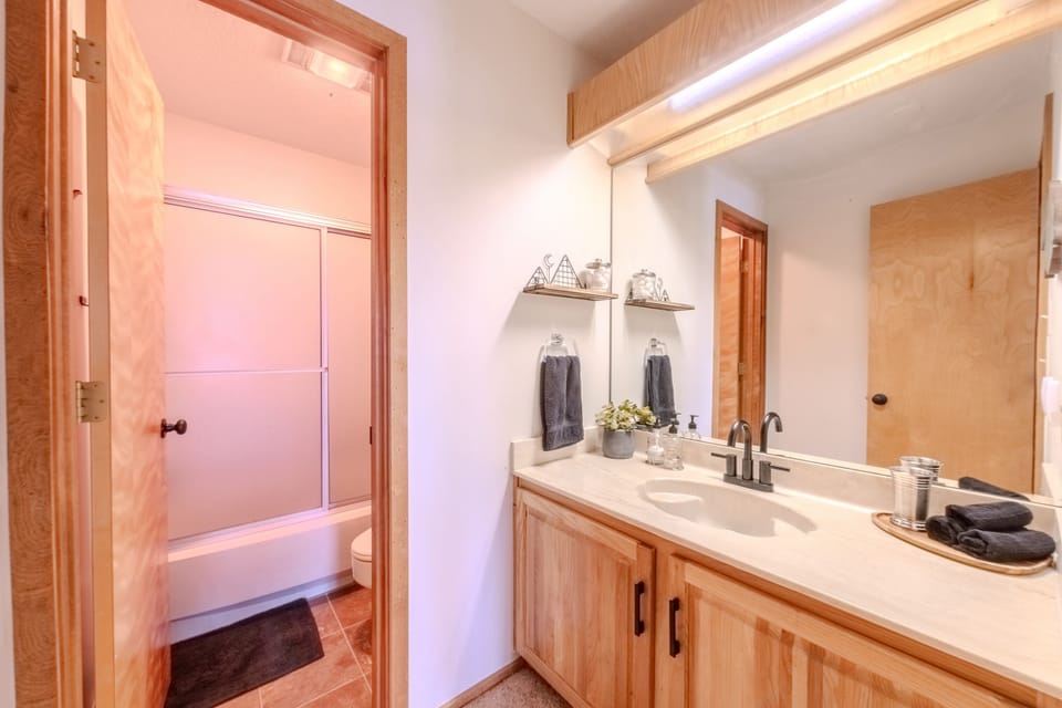 Split bathroom. Shower/Tub & Toilet separated from Vanity Sink Area. 