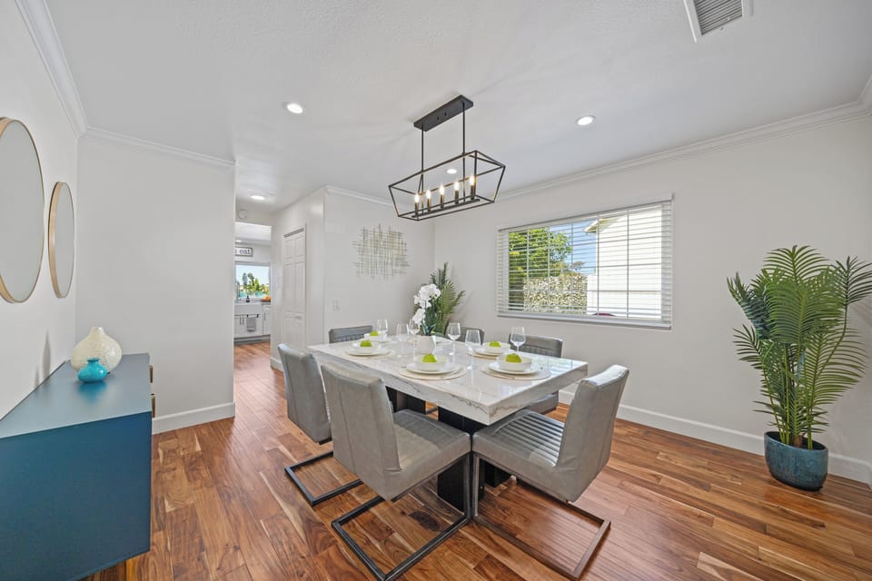 Dine in style in an elegant, modern dining room—perfect for meals and memories.