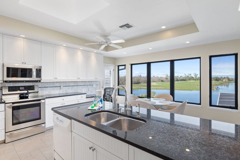Stunning chef's kitchen overlooking lake and golf course
