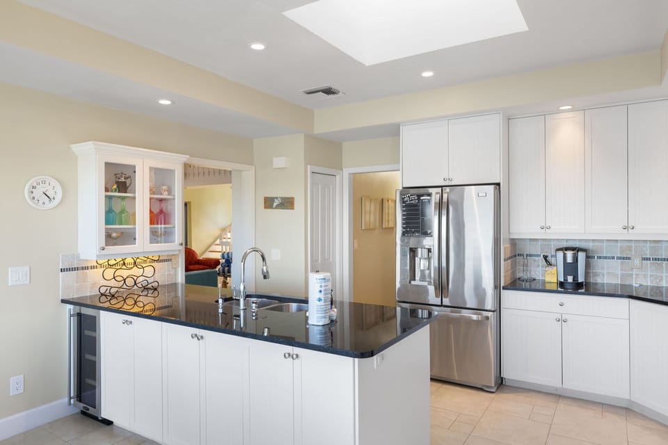 Stunning chef's kitchen overlooking lake and golf course