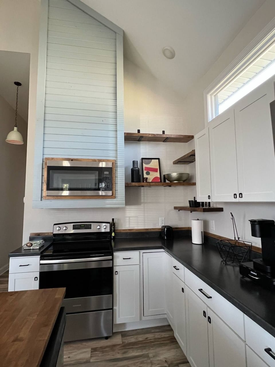 Kitchen with full sized appliances.