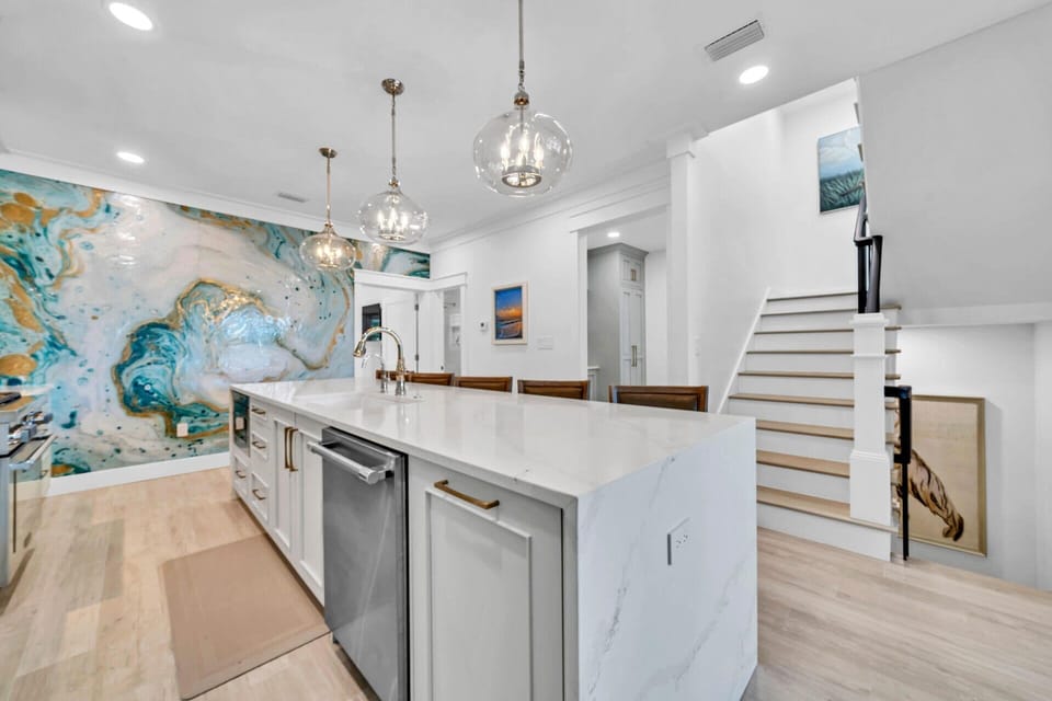 The kitchen is well stocked and features high-end finishes!