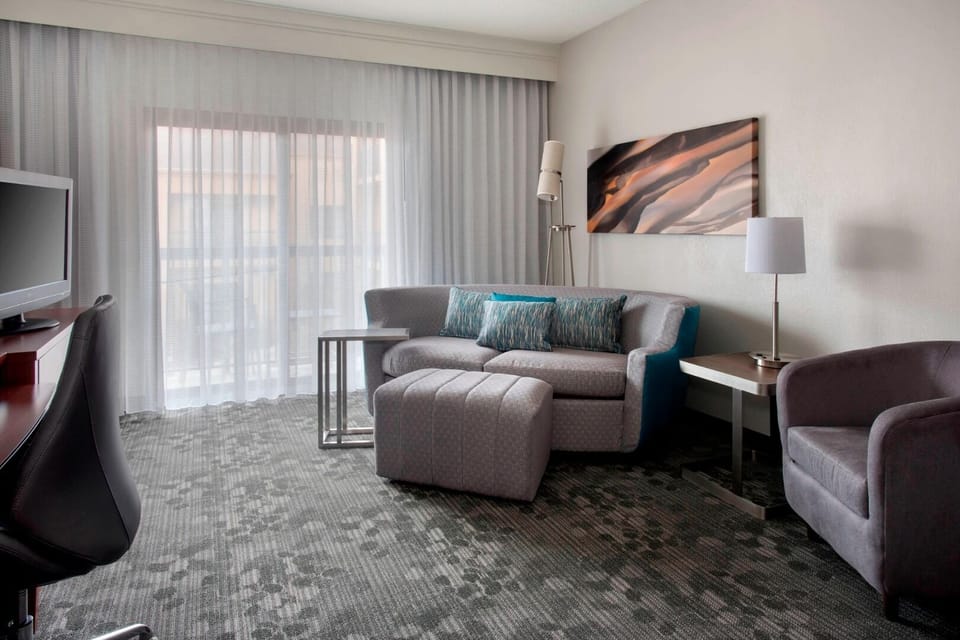 Relax on the roomy sofa and recharge by the window.