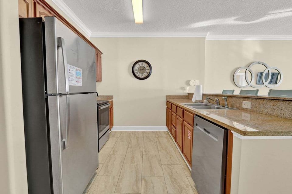 Stainless steel appliances give the space a clean, modern look.
