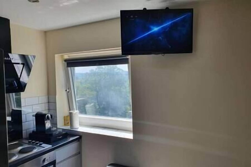 Smart TV in Kitchen/Dining area as well