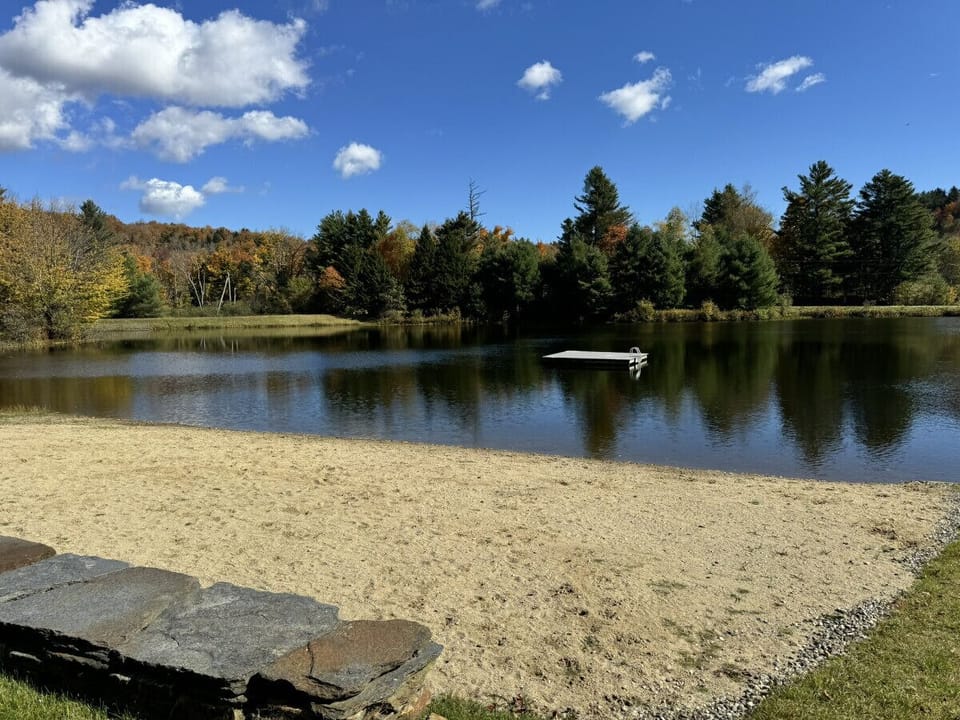 Sandy beach with swim platform