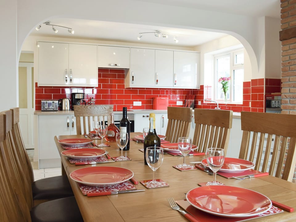Large dining area with open aspect to kitchen | Rudda Farm House - Rudda Farm Cottages, Staintondale, near Whitby