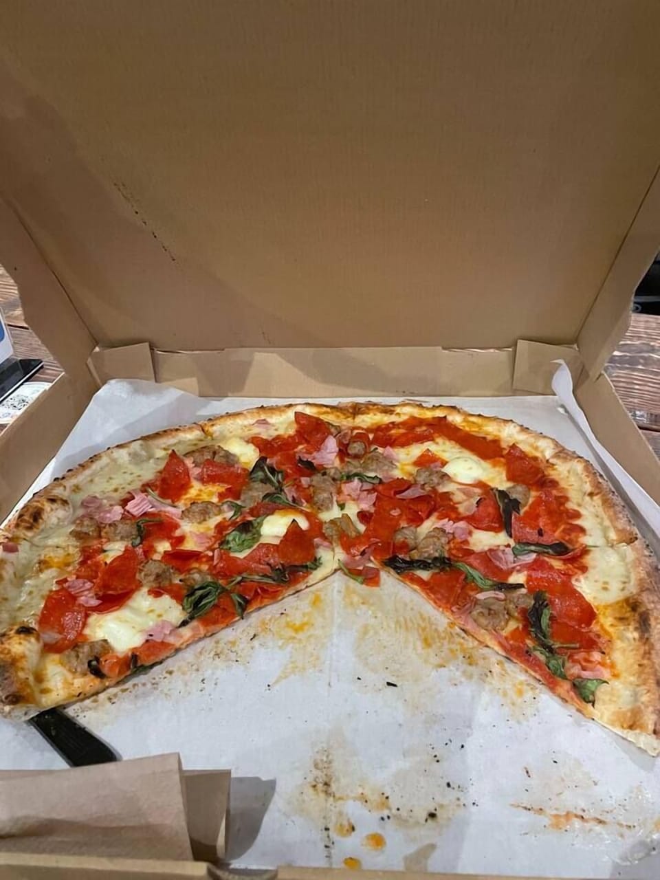Across the street at the Golden Belt. The true Italian style pizza from Cugino Forno is amazing ;]  