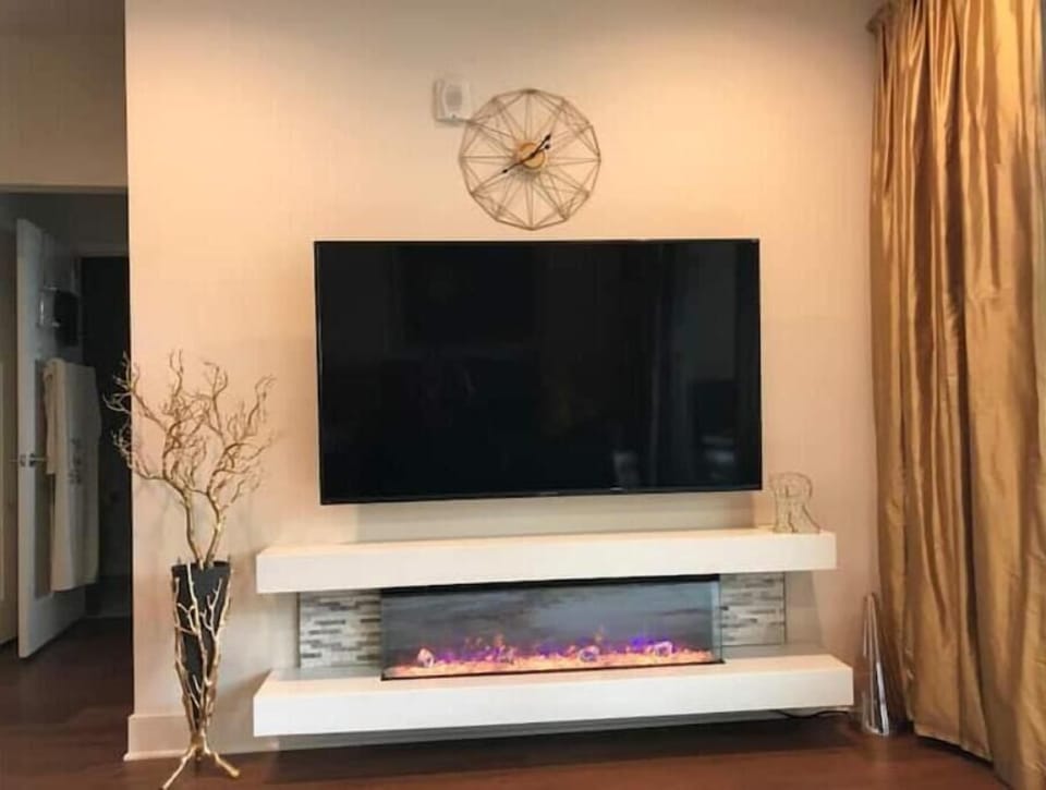 Smart TV. Fireplace gives off heat or is just a visual display