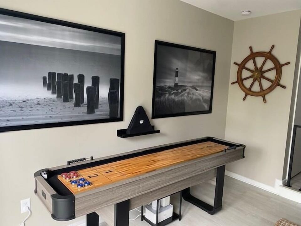 Shuffle Board table is located in the livingroom!