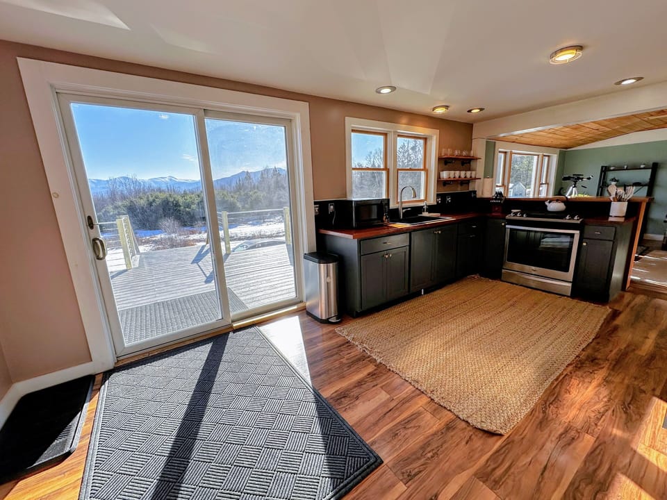 Kitchen with walkout slider to back deck