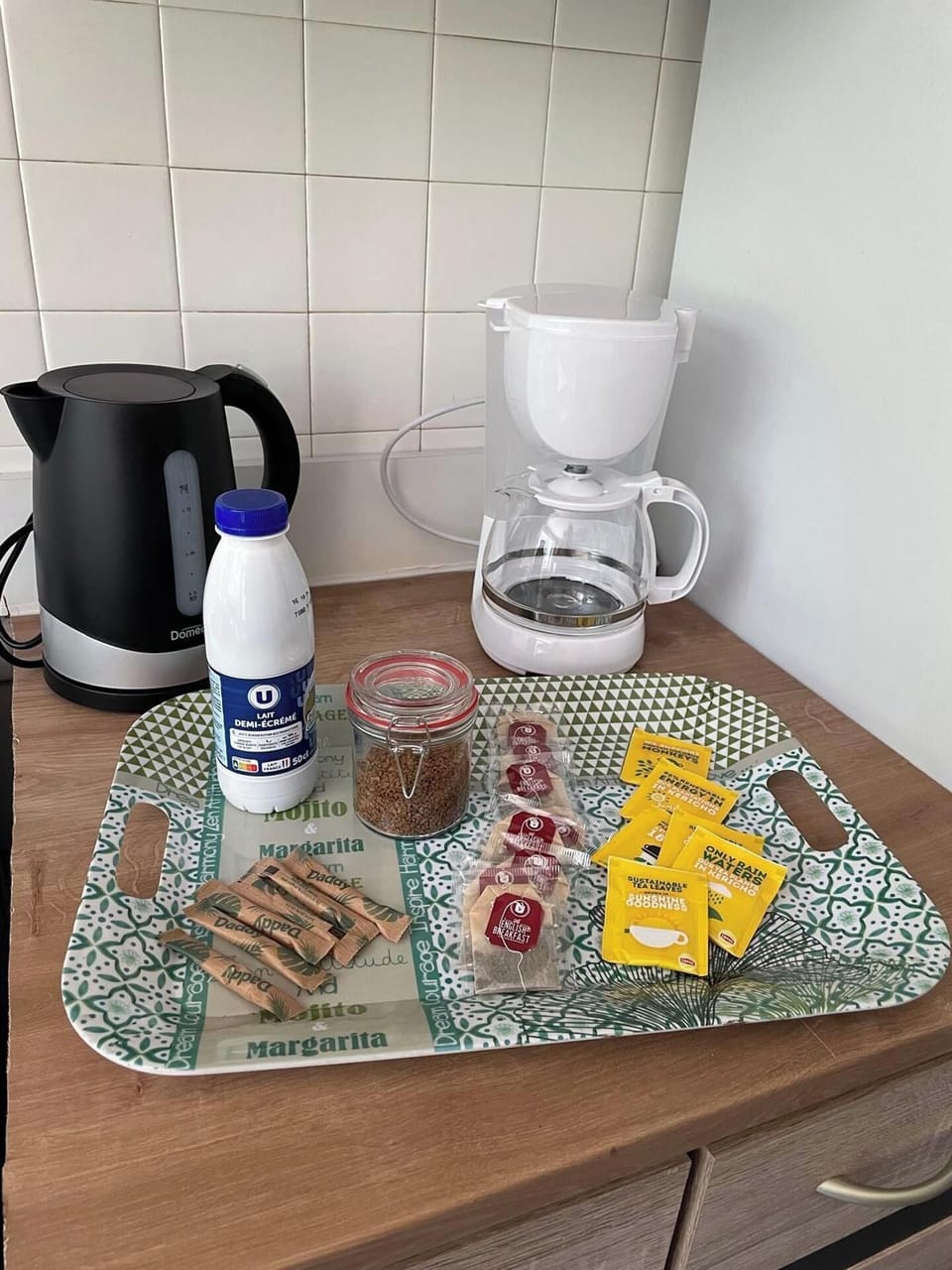 Welcome tray with tea, coffee, milk and sugar