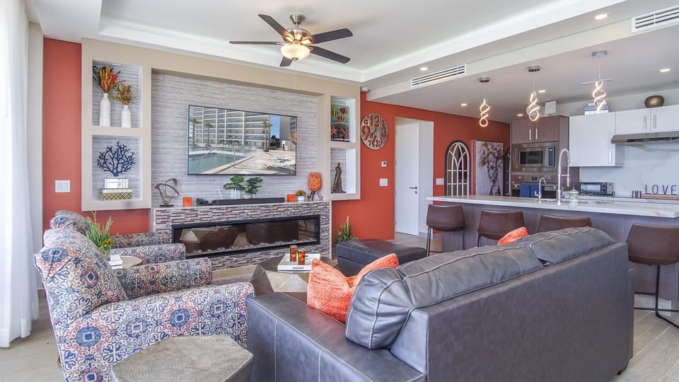 The living room is so stylish and comfy.