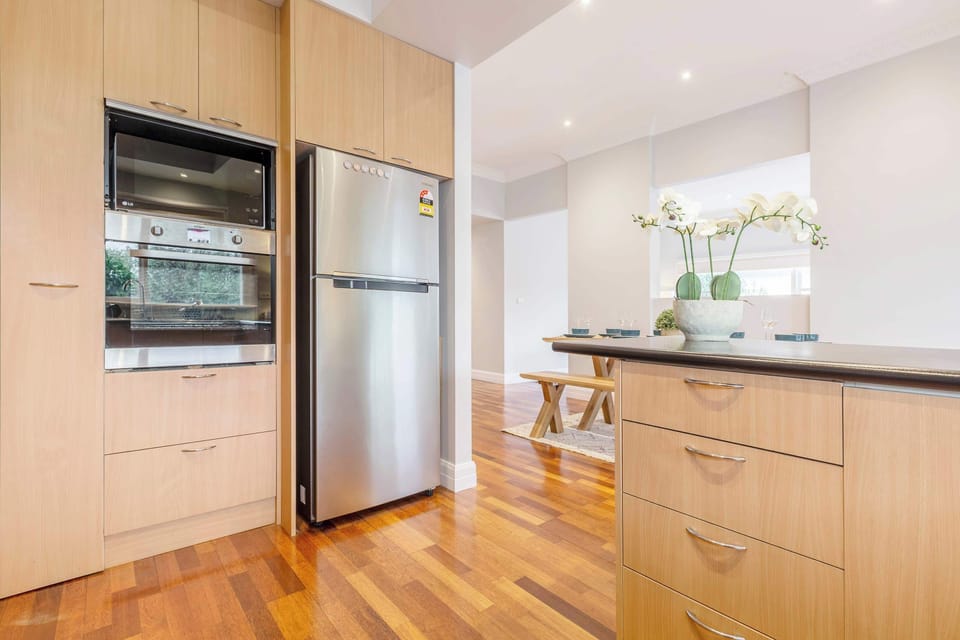 KITCHEN: From quick breakfasts to slow dinners, the fully equipped kitchen offers modern convenience within a timeless setting, with an open layout that makes it easy to cook, connect, and stay part of the conversation.