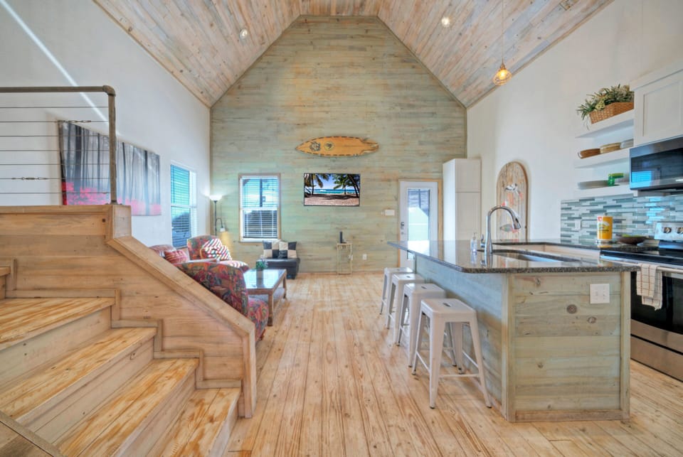 Open floor plan with rustic, beachy accents.