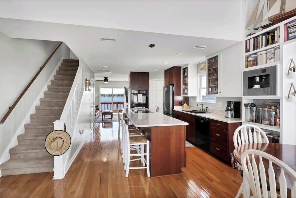 Welcoming entryway opens into the heart of the home, showcasing a spacious, well-appointed kitchen.