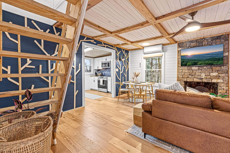 Steep Ladder Style Stairs Leading To The Master Bedroom Loft