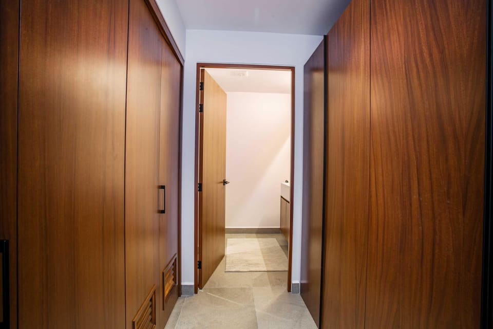 Hall to the bathroom, ample closet space, in-unit washer and dryer