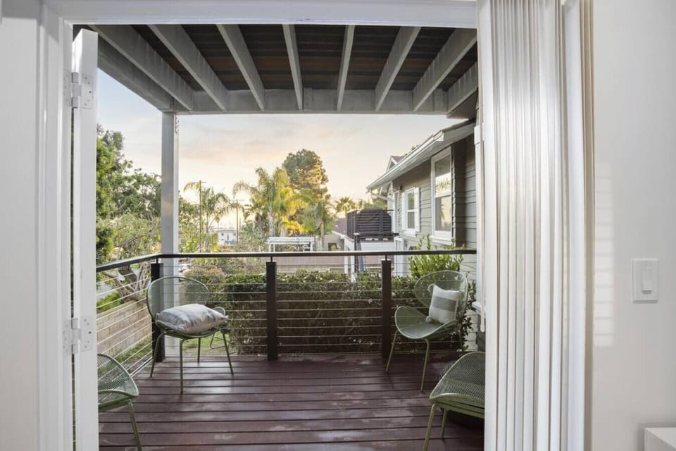 Step onto the first-level balcony from the living room.