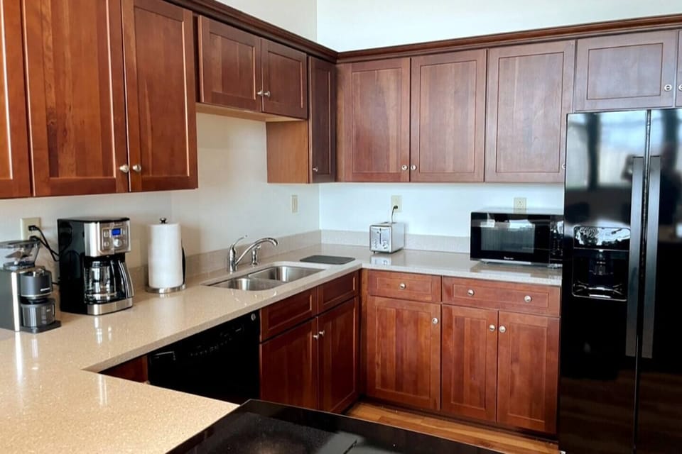 Kitchen with cherry cabinets
