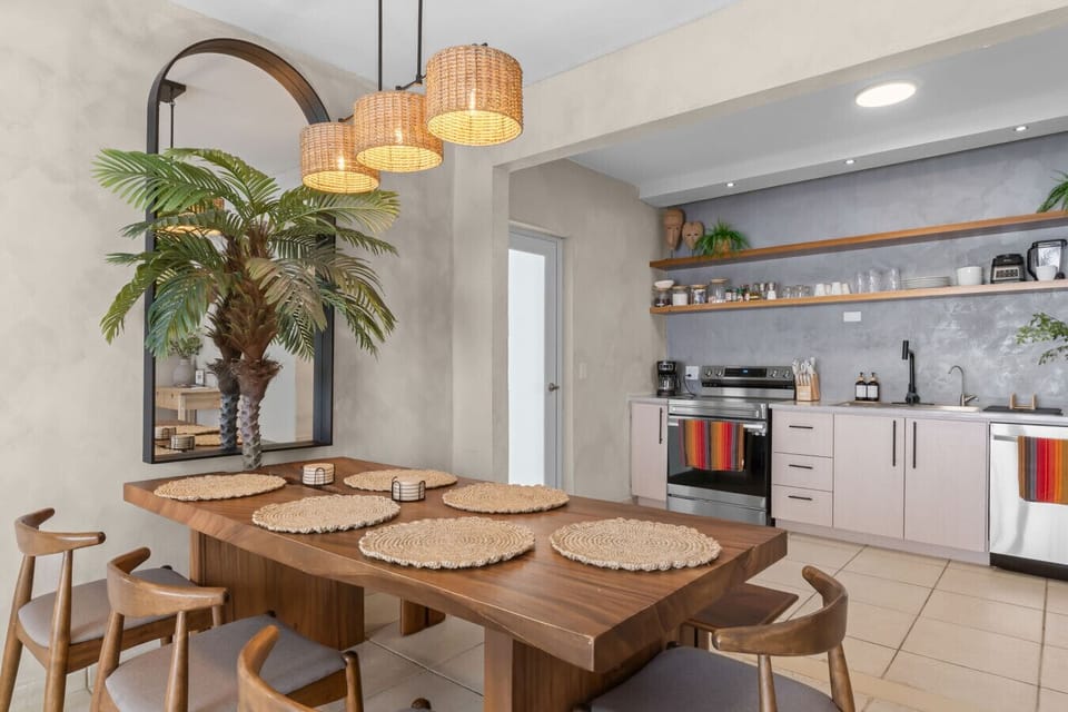 Open Concept for Easy Hosting. The seamless flow between the kitchen and dining area makes hosting large groups a breeze. You can prep meals in the fully equipped kitchen without missing out on the conversation. Guest Veronica noted: `Everyone had their o