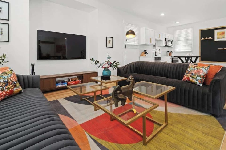 Comfortable lounge seating with colorful accents.