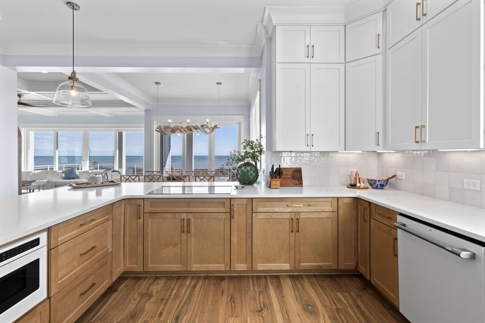 Kitchen features induction stove top overlooking the view