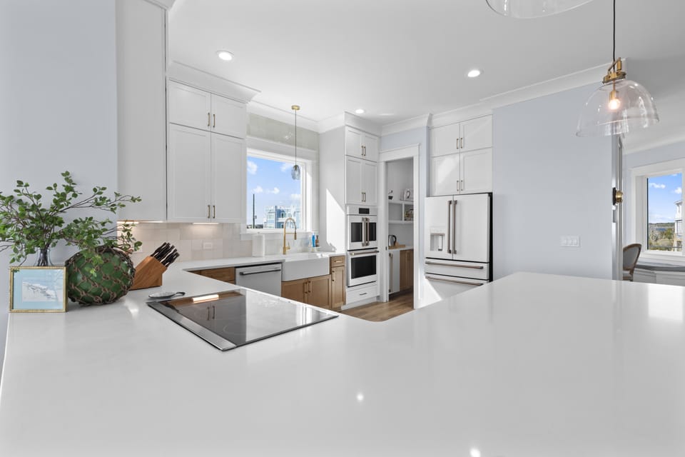 Fully equipped kitchen with Café appliances. 