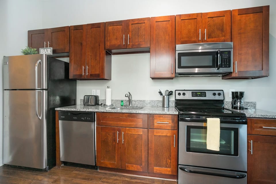 refrigerator, stove, microwave, oven, toaster, coffee maker