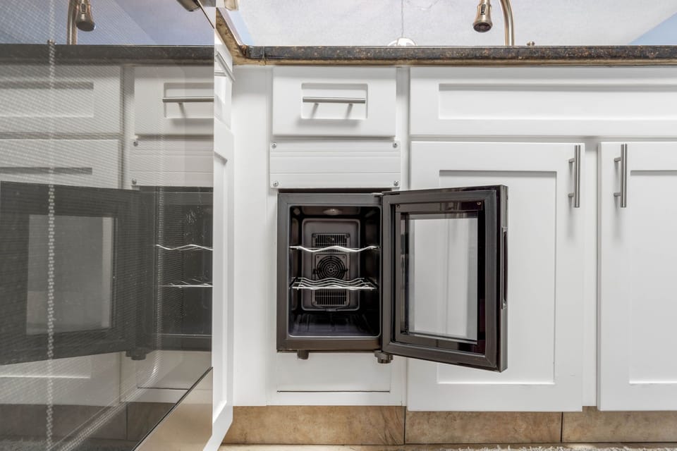 For the Wine Enthusiast:  personal wine refrigerator at your finger tips.