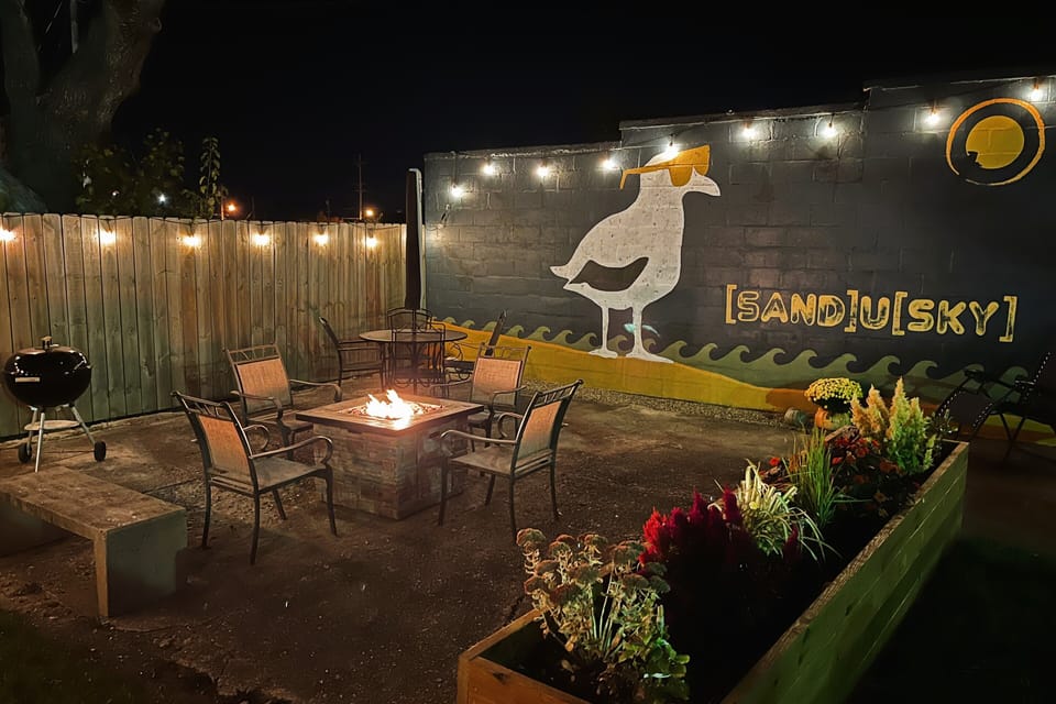 Fire table, BBQ grill, seating area and garden