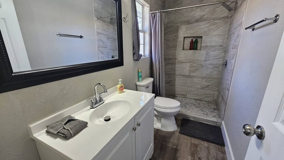The bathroom is designed to provide guests with a comfortable and relaxing experience.