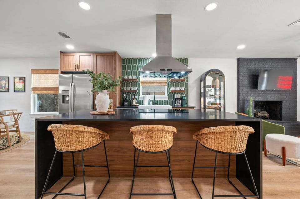Open concept kitchen with island seating for the perfect space to have some breakfast and coffee