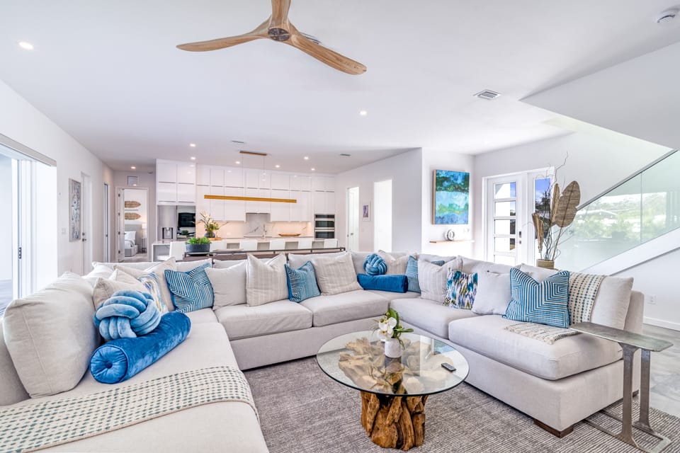 Relax in the heart of the home, where the open living room flows seamlessly into the kitchen.