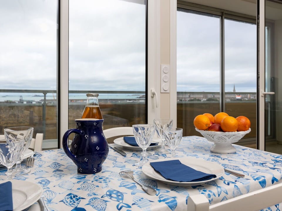 Tableware, Table, Sky, Furniture, Cloud, Window, Drinkware, Blue, Dishware, Chair