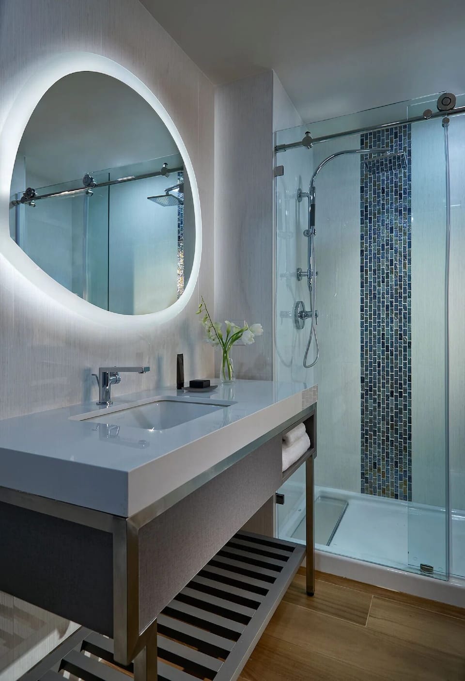 Rejuvenate with spa-like finishes and a bright, modern sink.