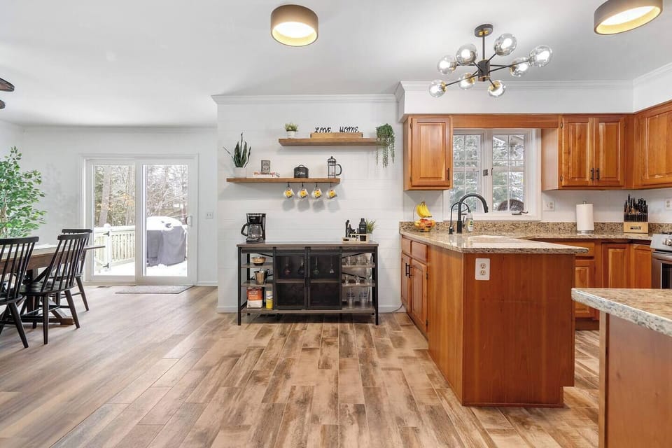 Main shot from the hallway, showcasing our coffee/wine bar area.  There's a regular coffee pot with filters, or use our French Press for those that like it a little more traditional. 