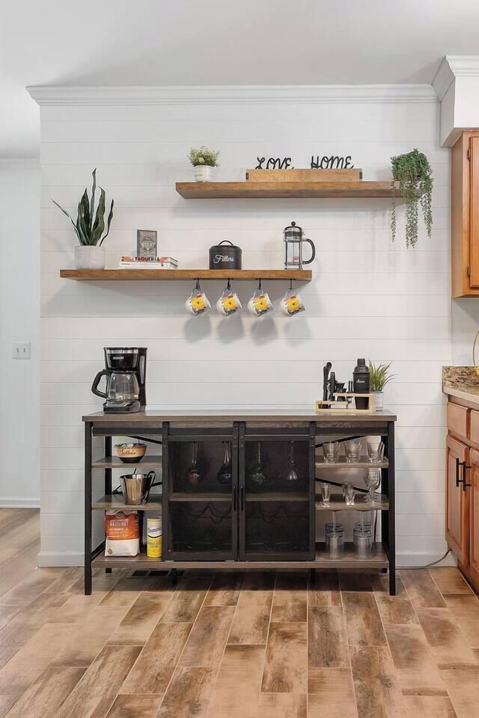 A close up view of the coffee/wine bar.  There's also cocktail mixers you can see opposite the coffee maker for those who want to show off what they can do with their friends and family.
