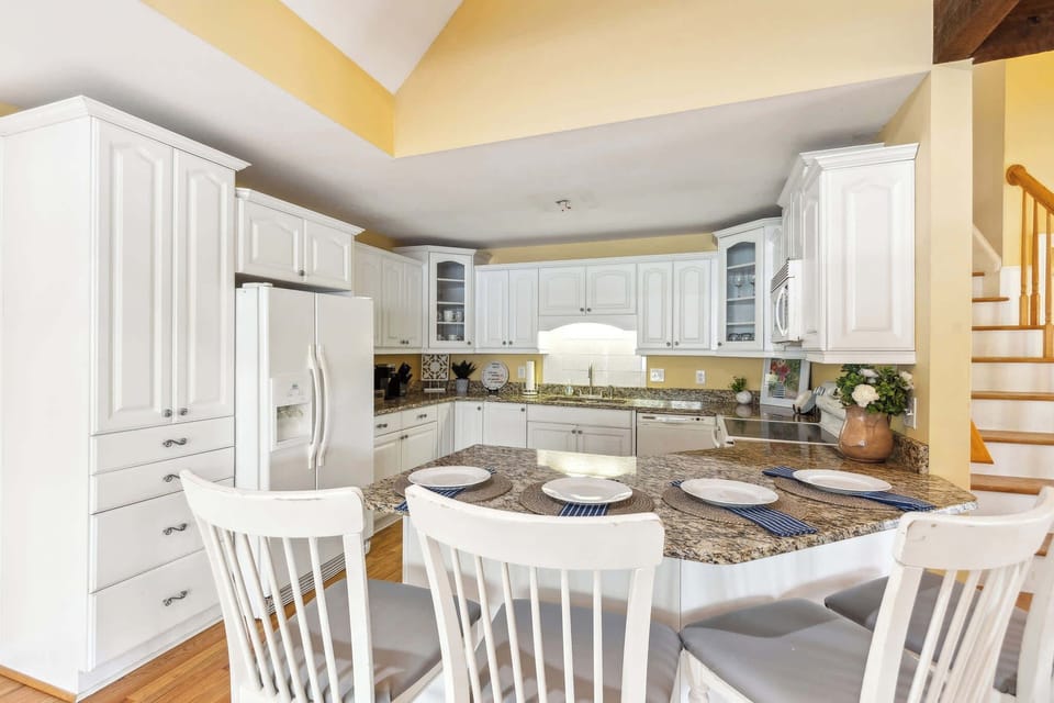 Gather around our inviting dining area—perfect for meals and making memories together