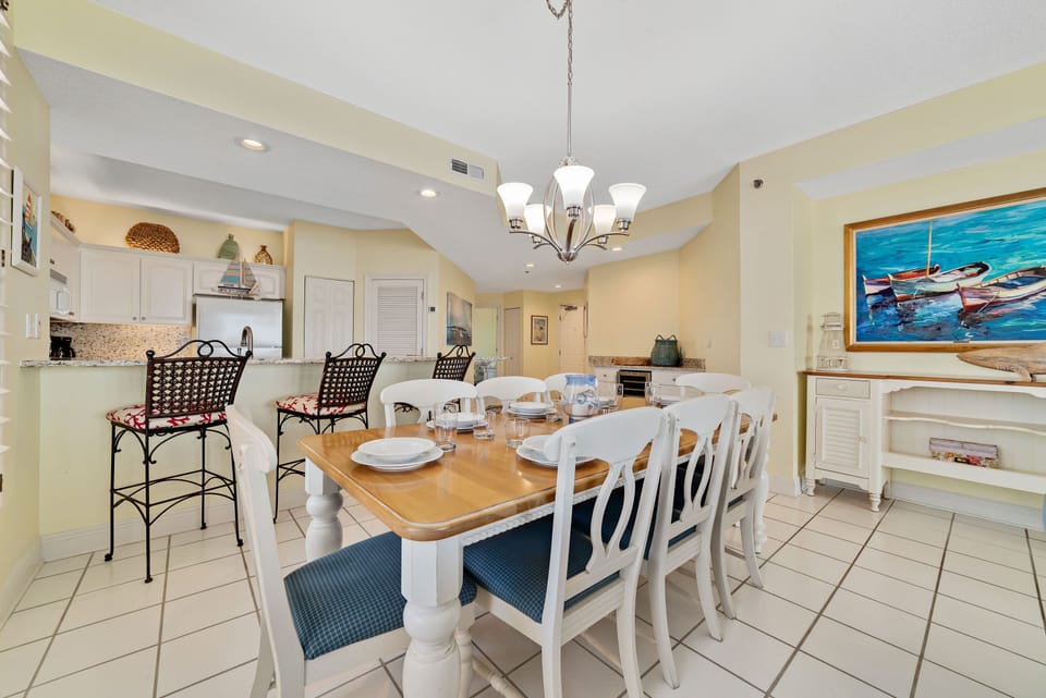 Gather, eat, and make memories. Our spacious dining area and adjacent breakfast bar provide plenty of room for guests to enjoy meals and conversations, creating the perfect setting for your vacation.