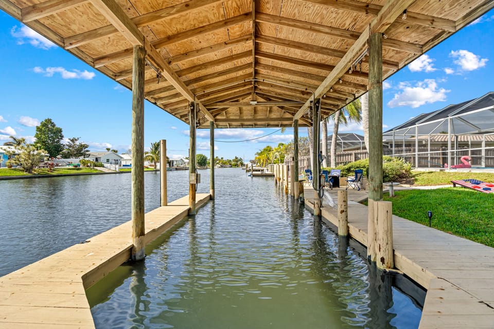 Dock your boat and tie off under shade with this amazing boat house slip. 